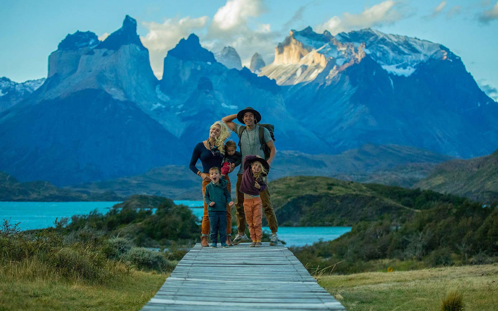 image of the family standing in front of mountain range